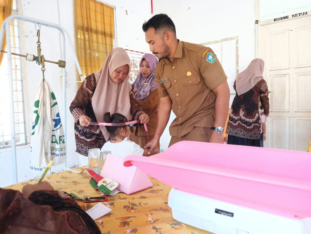 Dalam rangka GATI ayah membawa anak ke posyandu