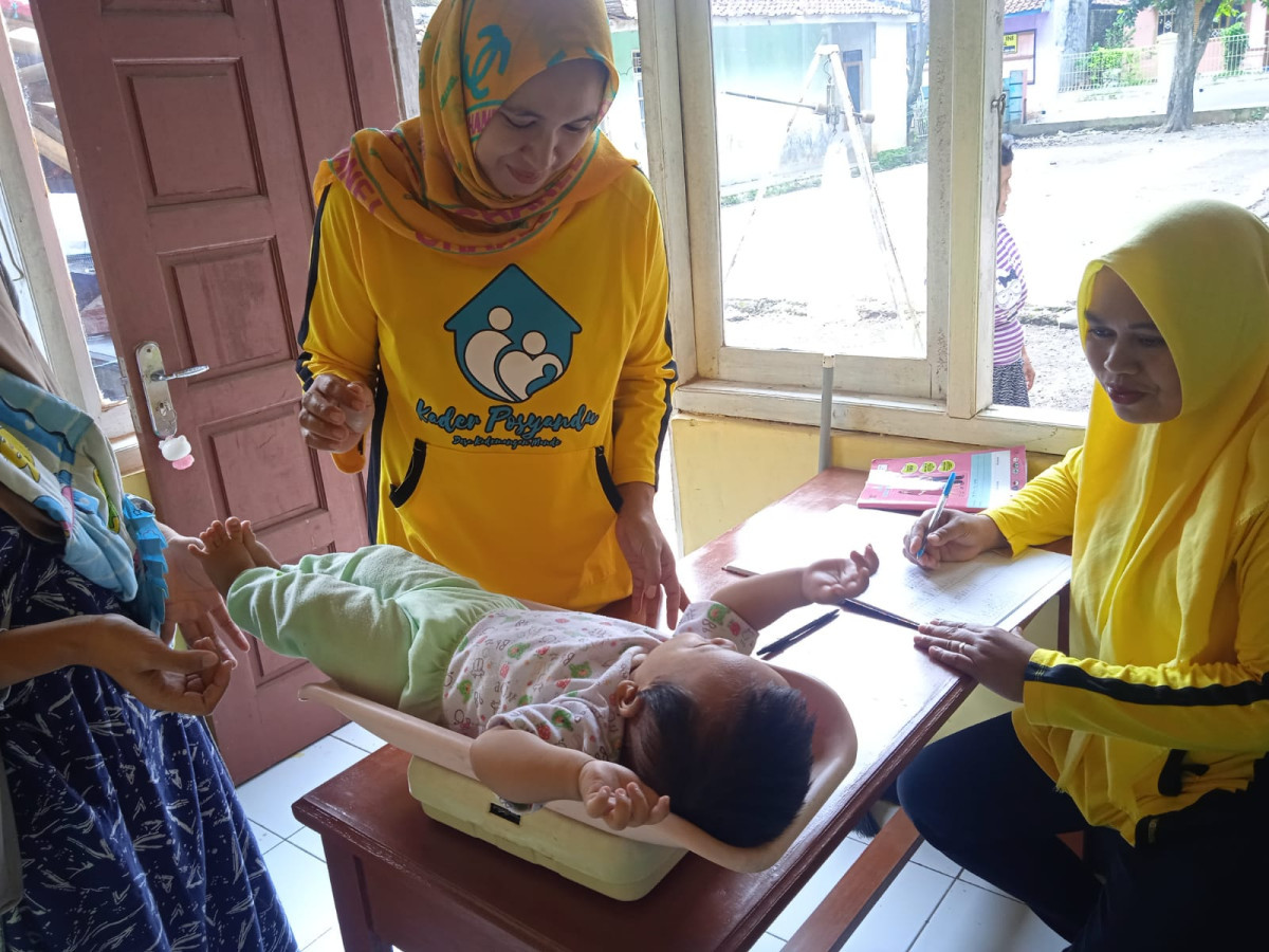 GIAT PENIMBANGAN DI POSYANDU