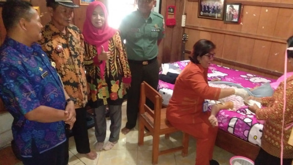 Pelayanan KB Implant IUD dalam Rangka Memperingati Hari Kontrasepsi Se Dunia Di kampung KB Dusun Mangun Sejahtera