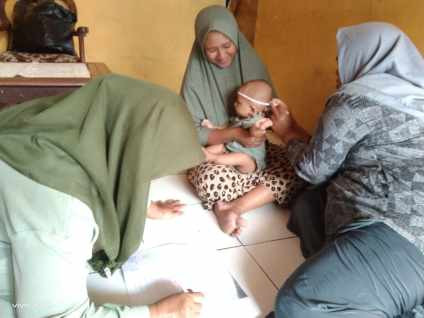 Kegiatan Tim Pendamping Keluarga (TPK) Baduta Desa Buko