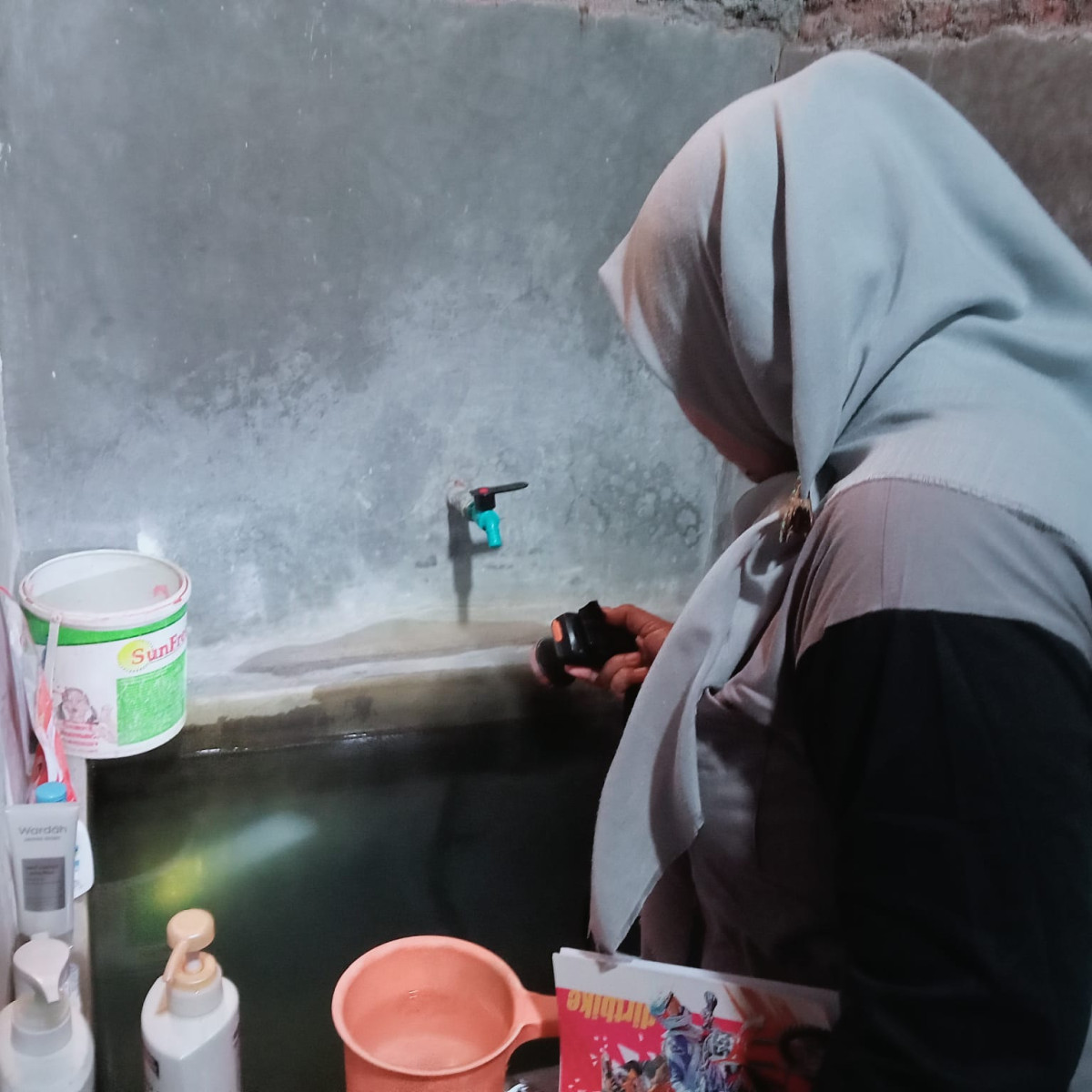 Kegiatan Pemberantasan Sarang Nyamuk (PSN) di RT 02 RW 04 Bulan Juli 2025