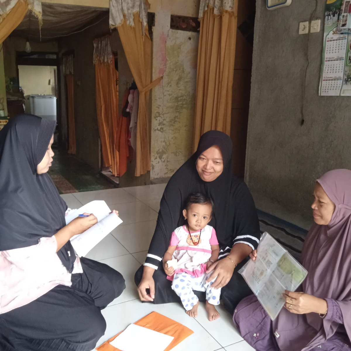 Kunjungan baduta oleh tim TPK desa mandung