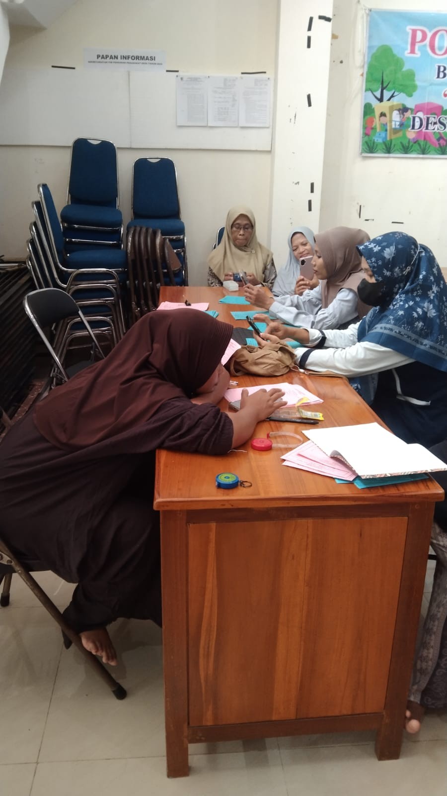 Pengentrian posyandu balita oleh kader mandung