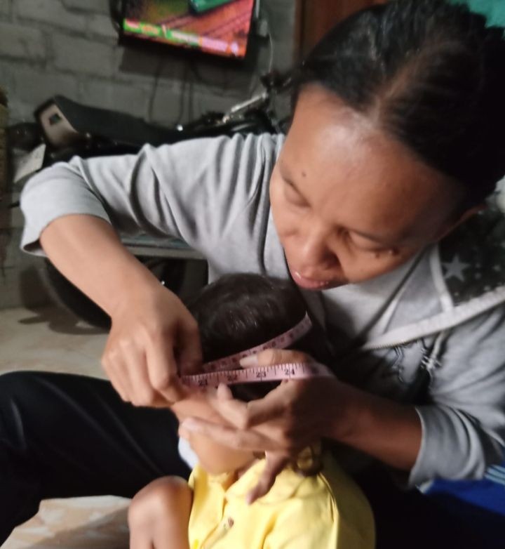 Kunjungan kader kpd balita yg tdk hadir di posyandu (jimat)