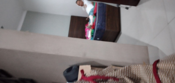 Bapak Heri yang sedang terbaring sakit di rumah setelah pulang dari Rumah Sakit