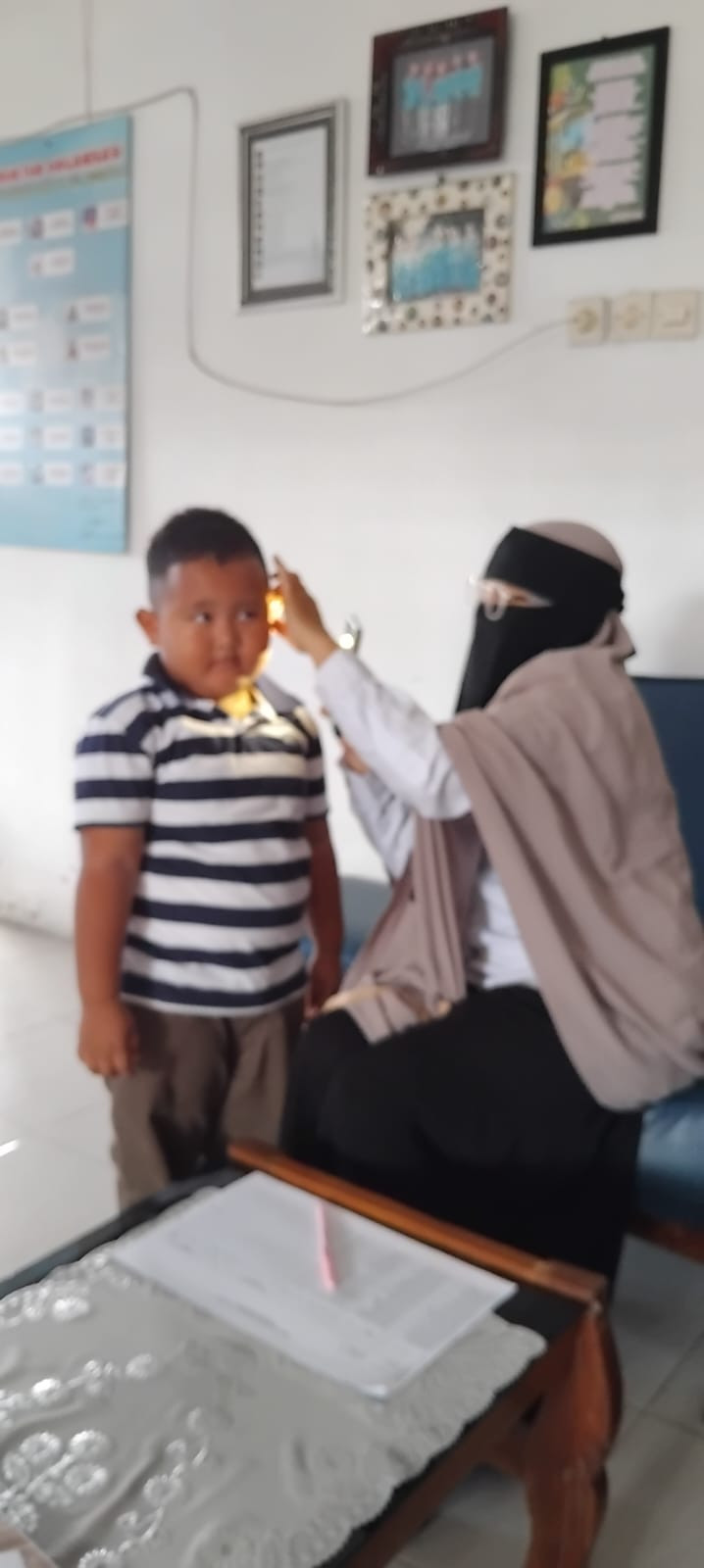 Pemeriksaan SDIDTK oleh Petugas Puskesmas Ngemplak 2 di KB PKK MUtiara Hati Malangrejo