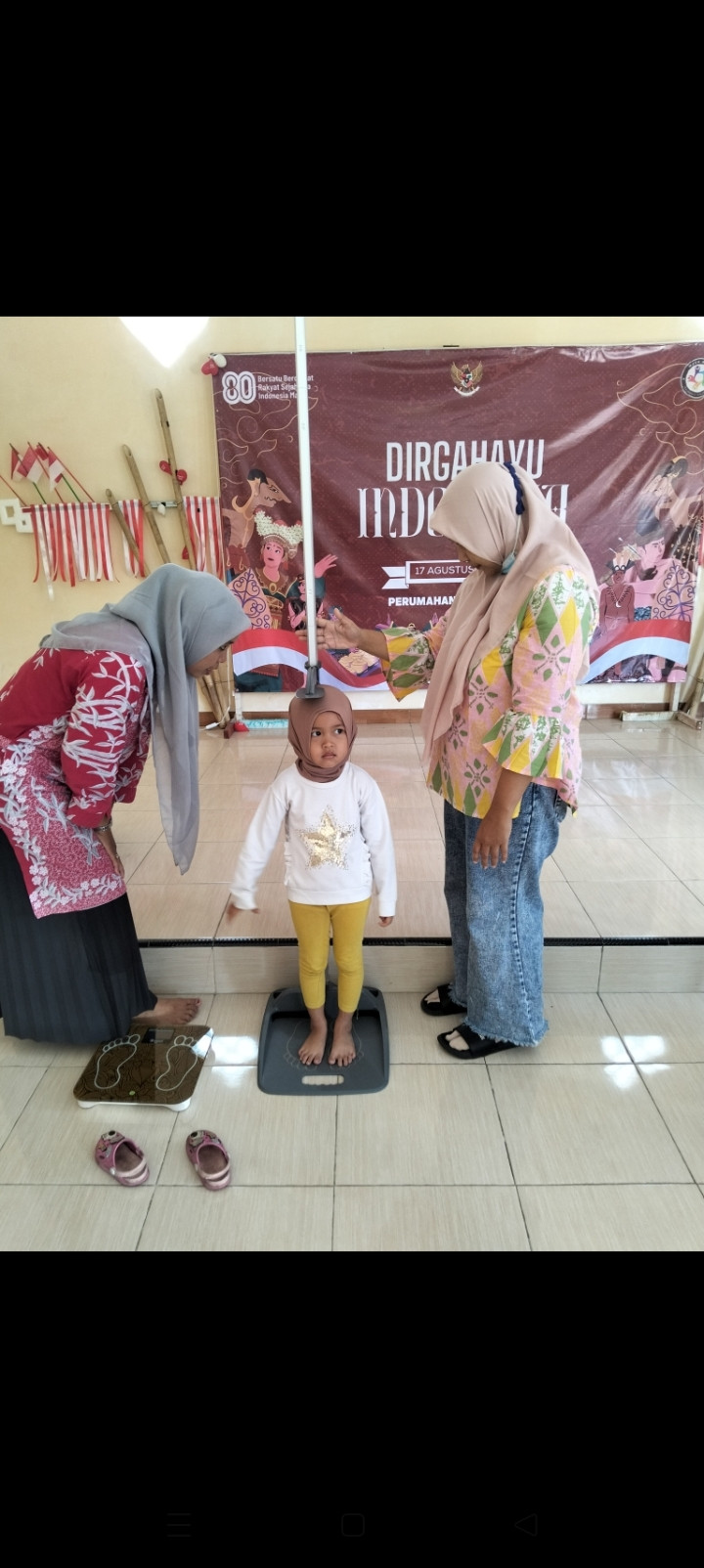 Mengukur tinggi badan