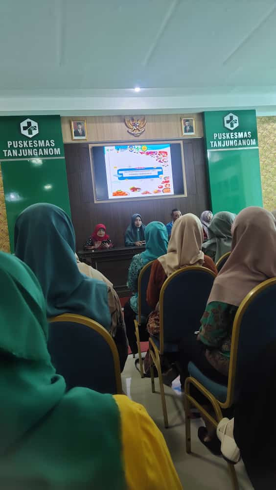 pelatihan tim pelaksana PMT lokal Puskemas Tanjungaom