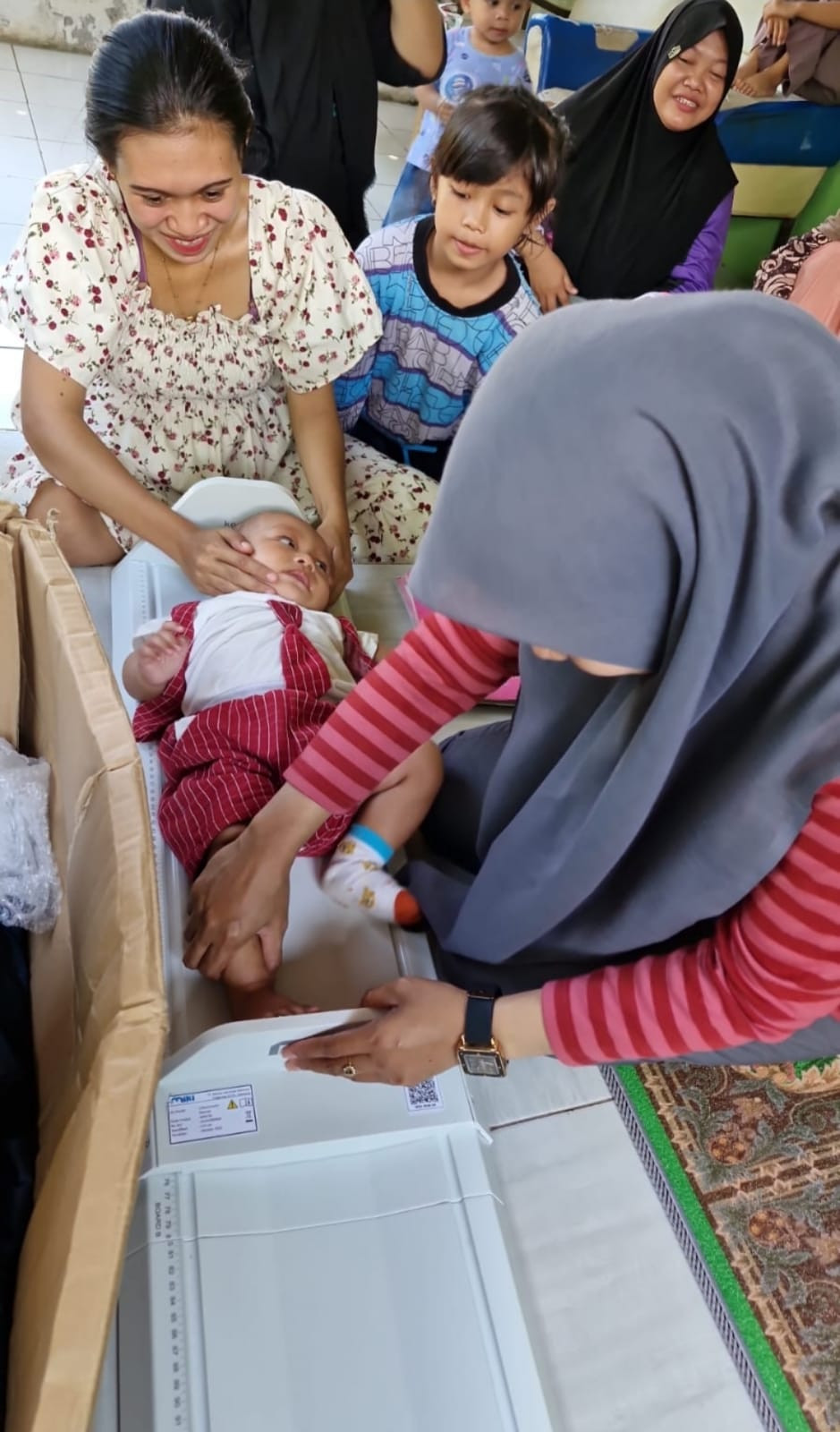 MEngukur panjang badan baduta