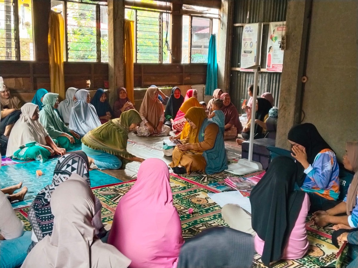 Melaksanakan Posyandu Aktif