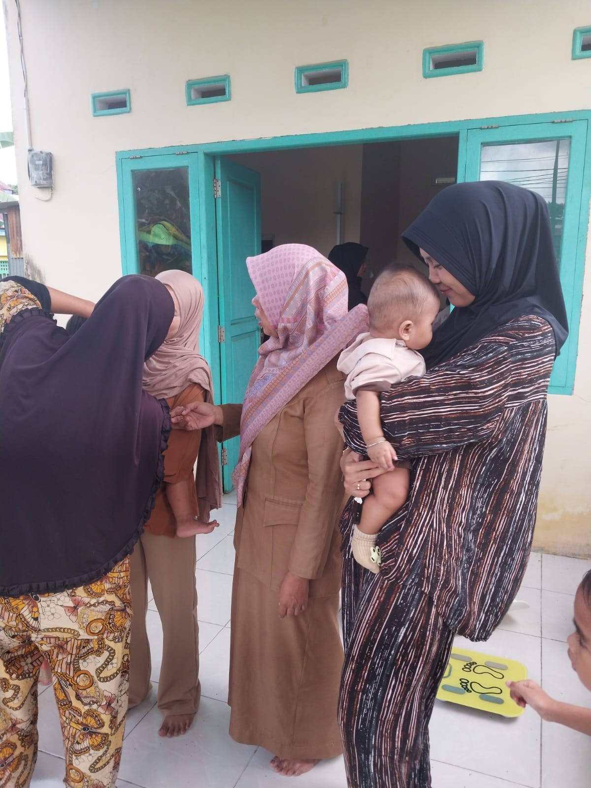 Pemantauan pertumbuhan dan perkembangan anak balita.