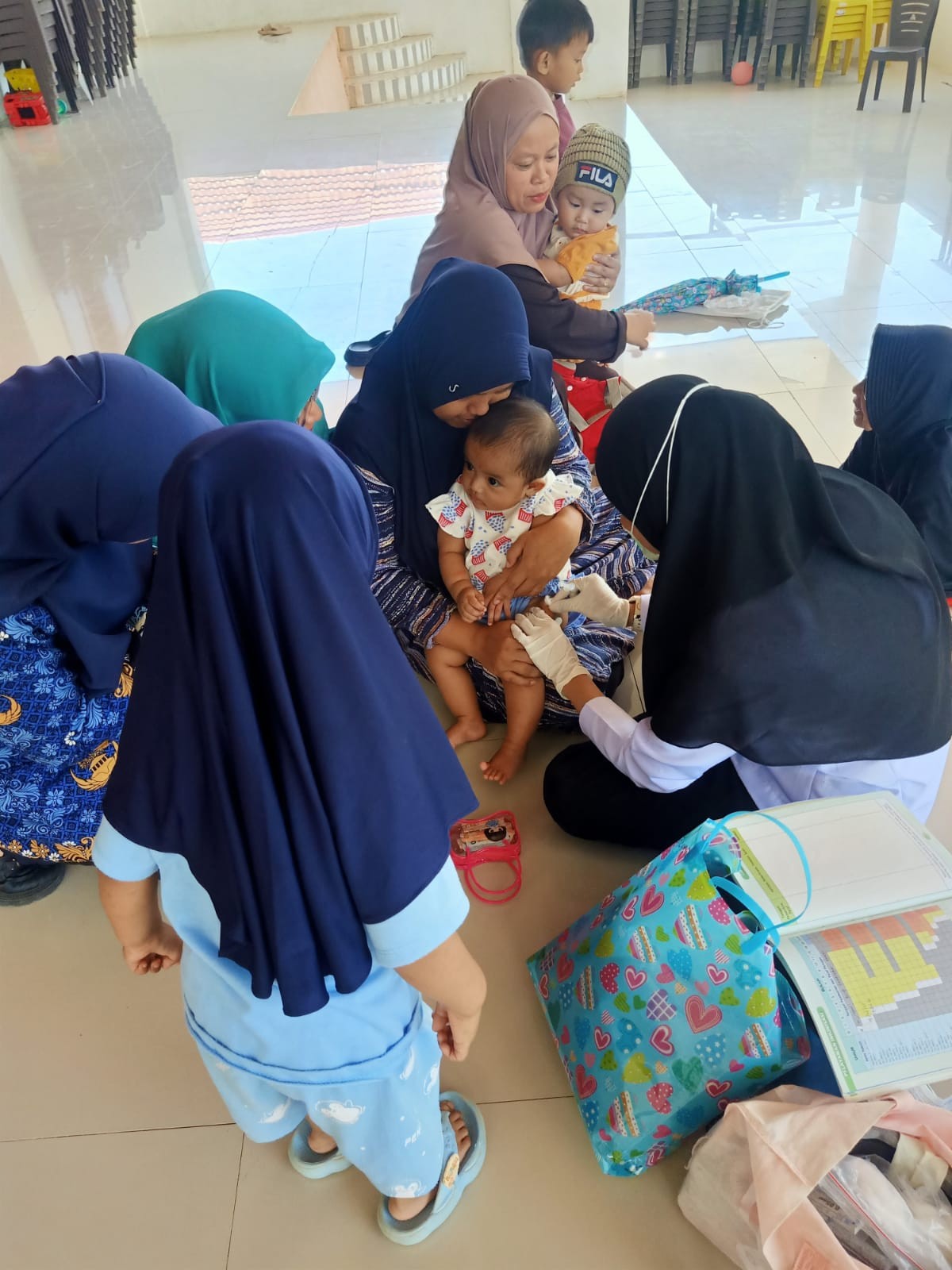 Pemantauan pertumbuhan dan perkembangan anak