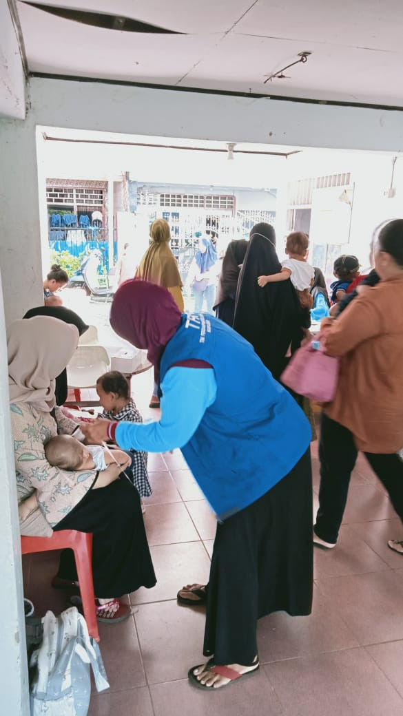 Melaksanakan Posyandu Aktif