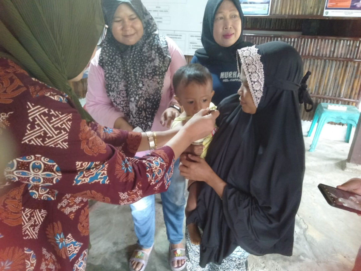 Melaksanakan PMT Berbasis Pangan Lokal