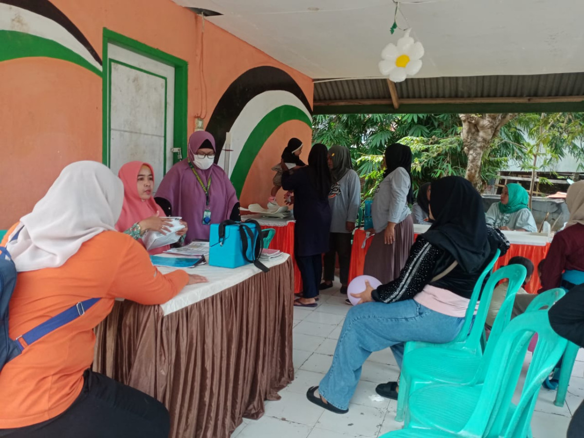 Melaksanakan Kegiatan Posyandu