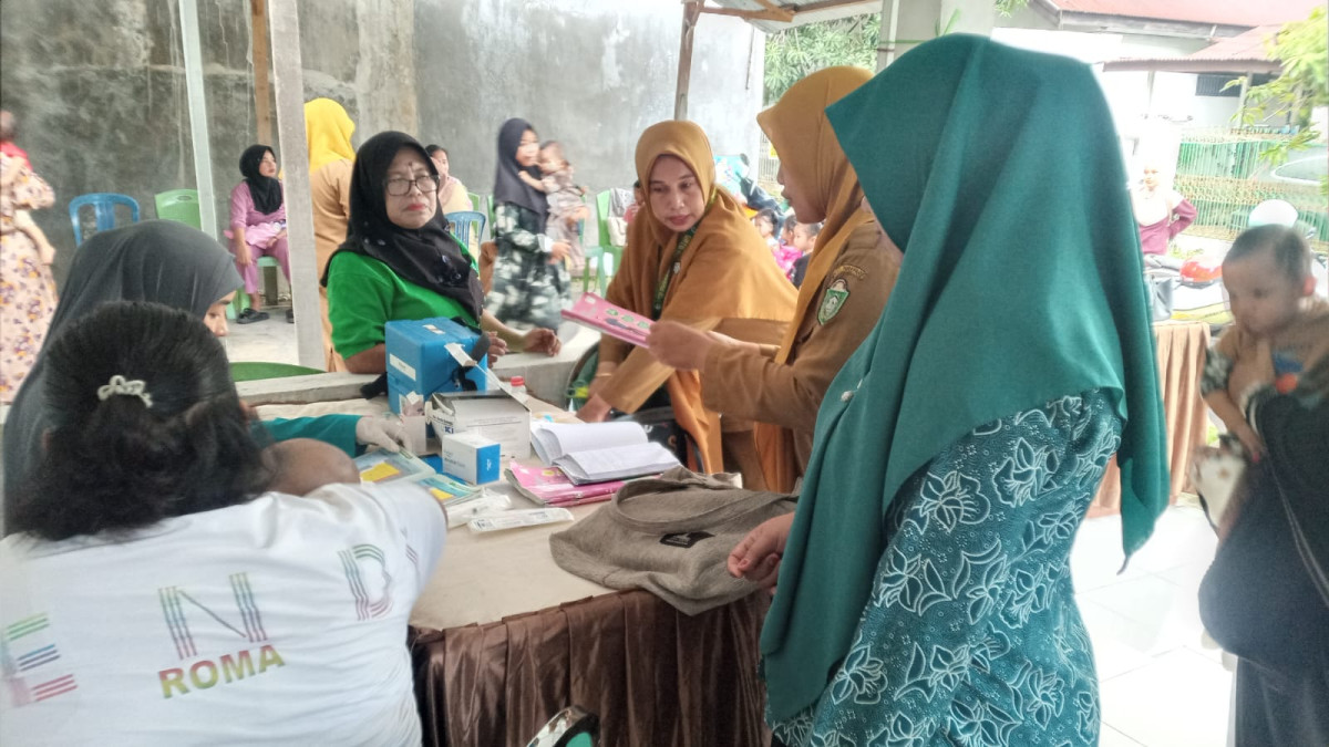 Melaksanakan Kegiatan Posyandu