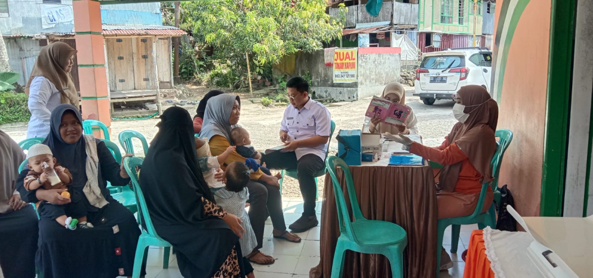 Melaksanakan Posyandu Baduta/Balita