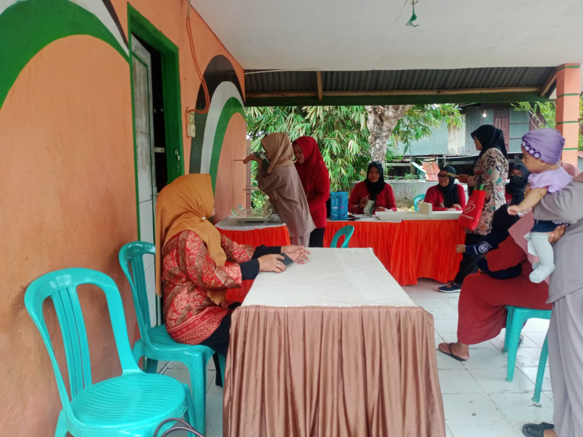 Melaksanakan Kegiatan Posyandu