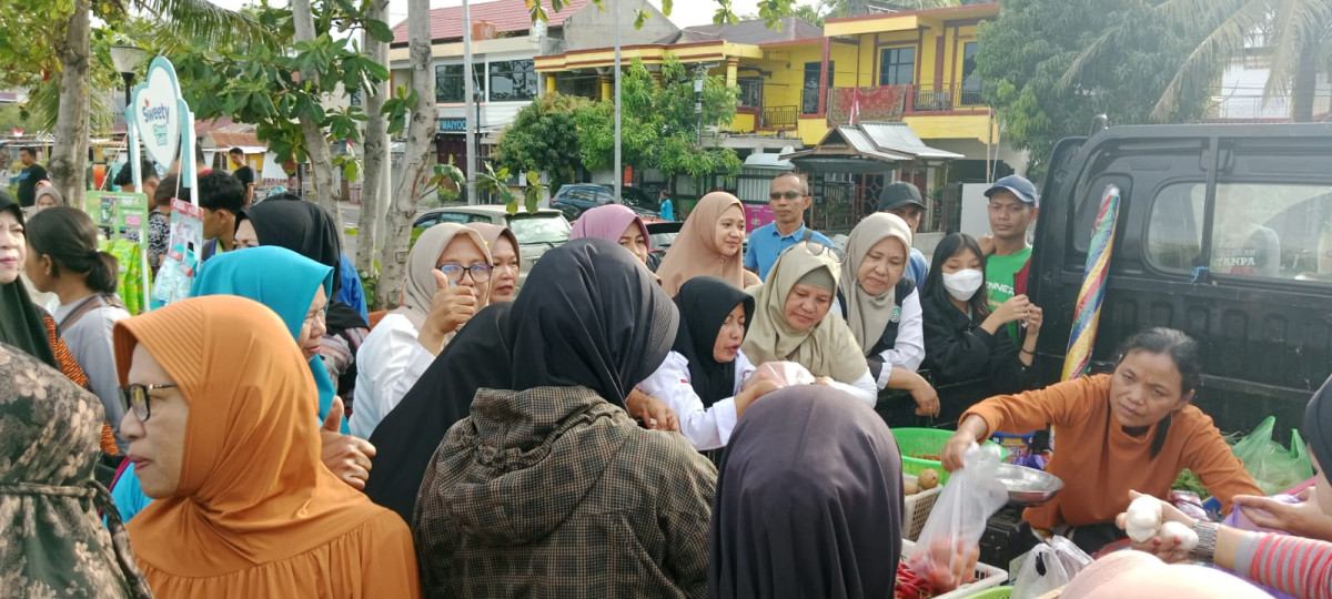 Melaksanakan Kopi Mobile dan Kegiatan Pangan Murah