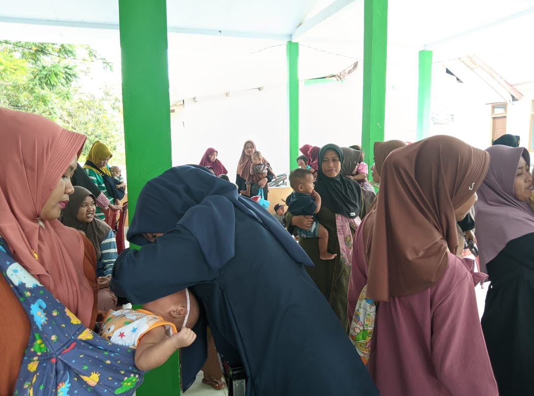 b. Melaksanakan Posyandu Aktif