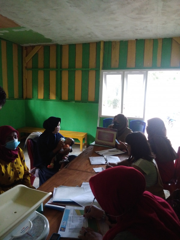 Melaksanakan Kegiatan Posyandu di Kampung KB